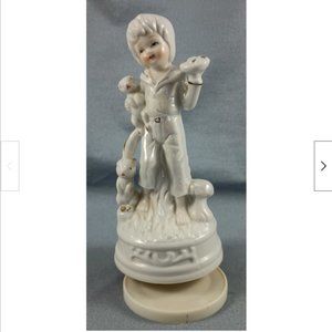 Vintage Small World Musical Spinning Ceramic Pearlescent White Gold Boy Figurine